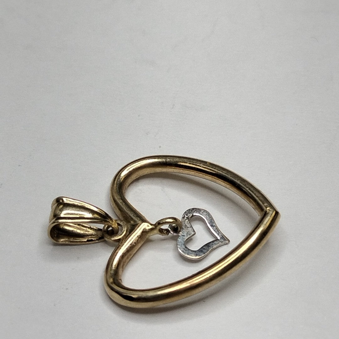 DIJE. ORO, ORO BLANCO. 14 K 1 GRMS (SEMINUEVO)