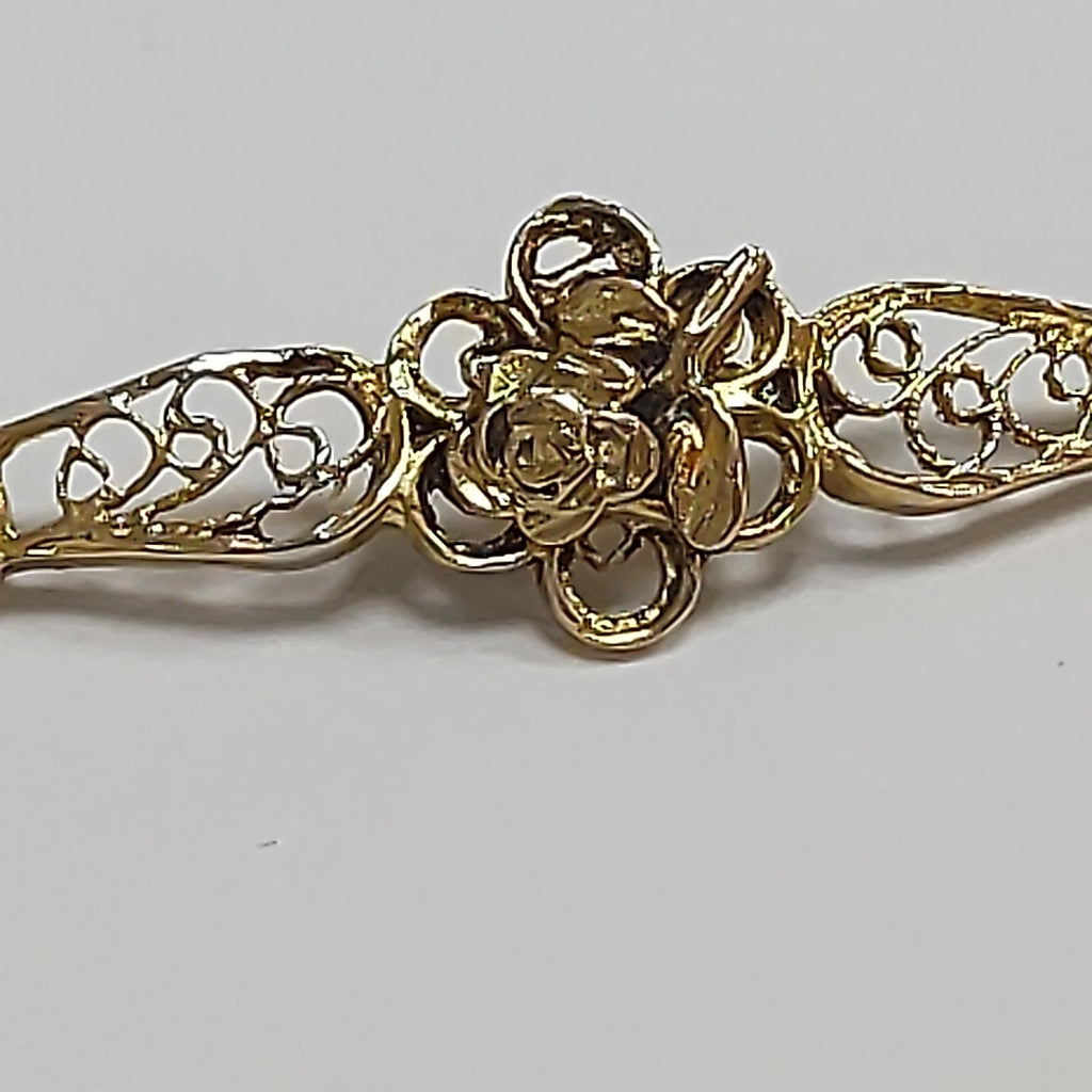 K1 6,80 GRMS 10 K ESPECIFICACIONES COMPLEMENTARIAS POLSERA CON FLOR (SEMINUEVO)