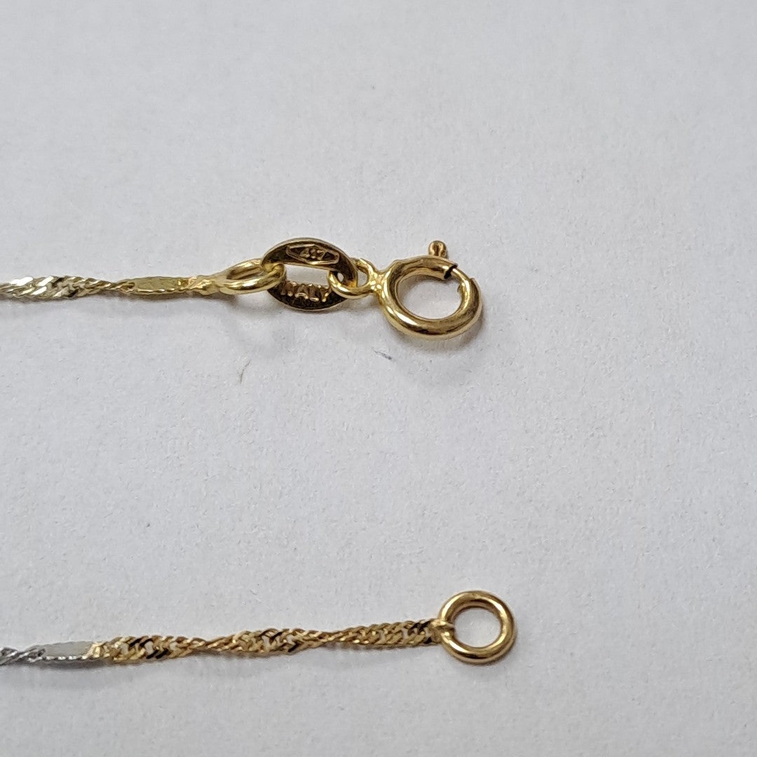 CADENA, DIJE ORO, ORO COMBINADO 10 K 1.3 GRMS (SEMINUEVO)