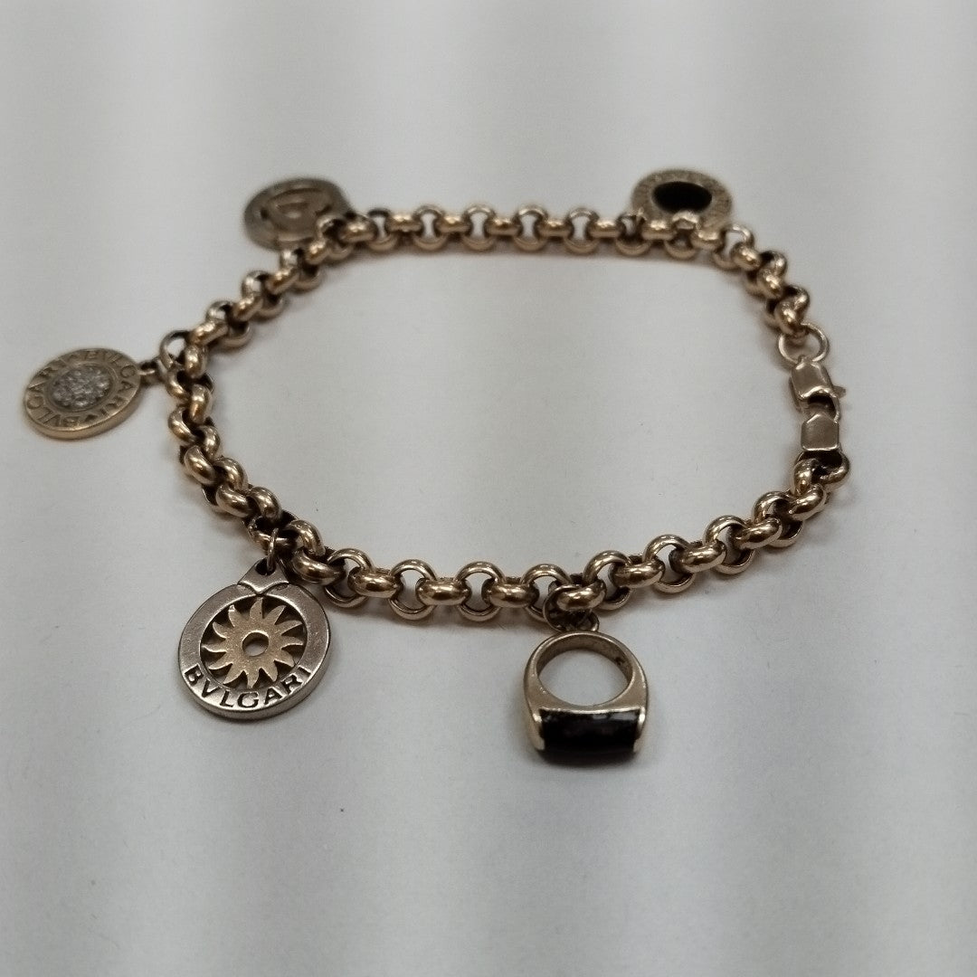 K1 15,30 GRMS 14 K ESPECIFICACIONES COMPLEMENTARIAS PULSERA CON COLGANTES TIPO (SEMINUEVO)