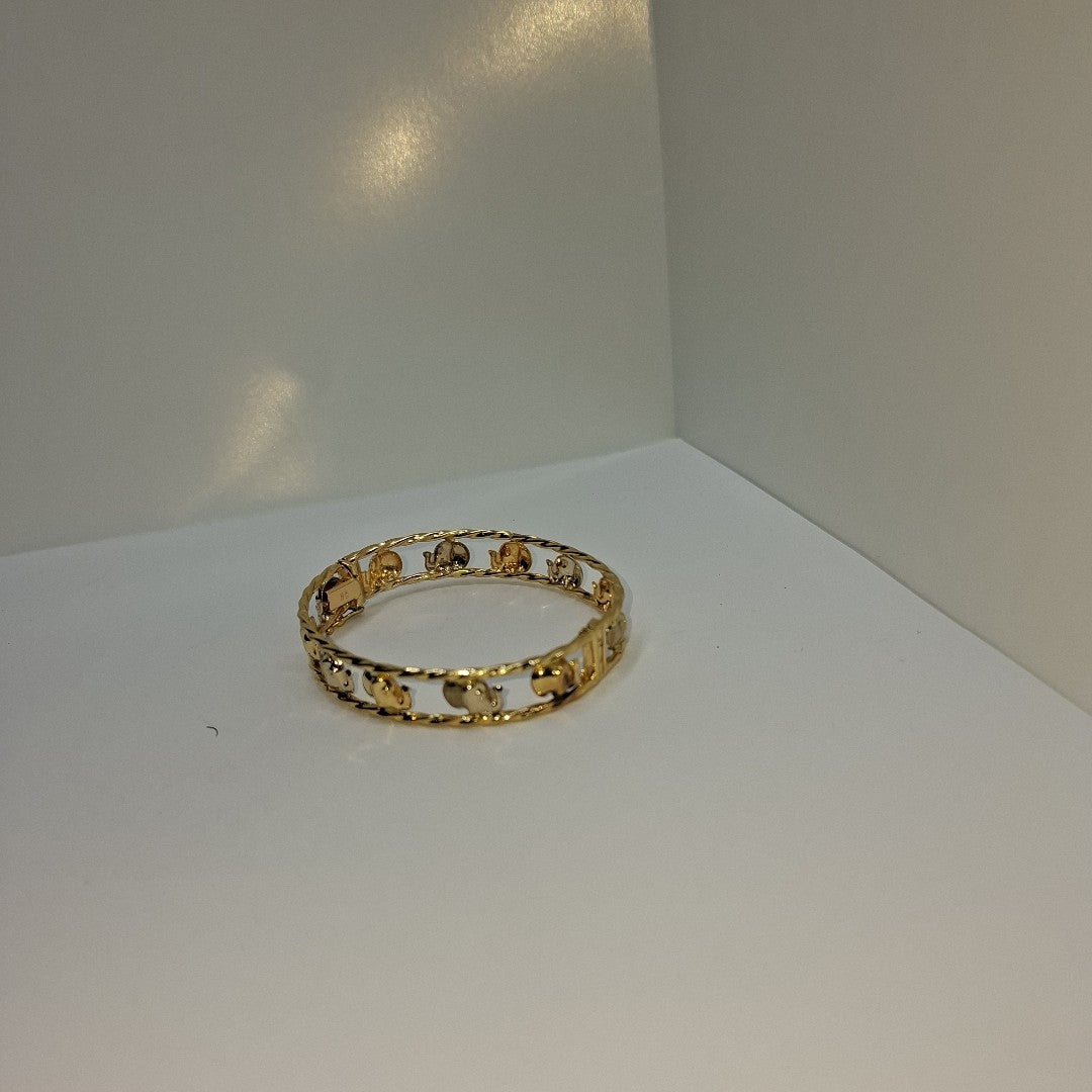 PULSERA RIGIDA ORO COMBINADO 14 K 9.6 GRMS (SEMINUEVO)