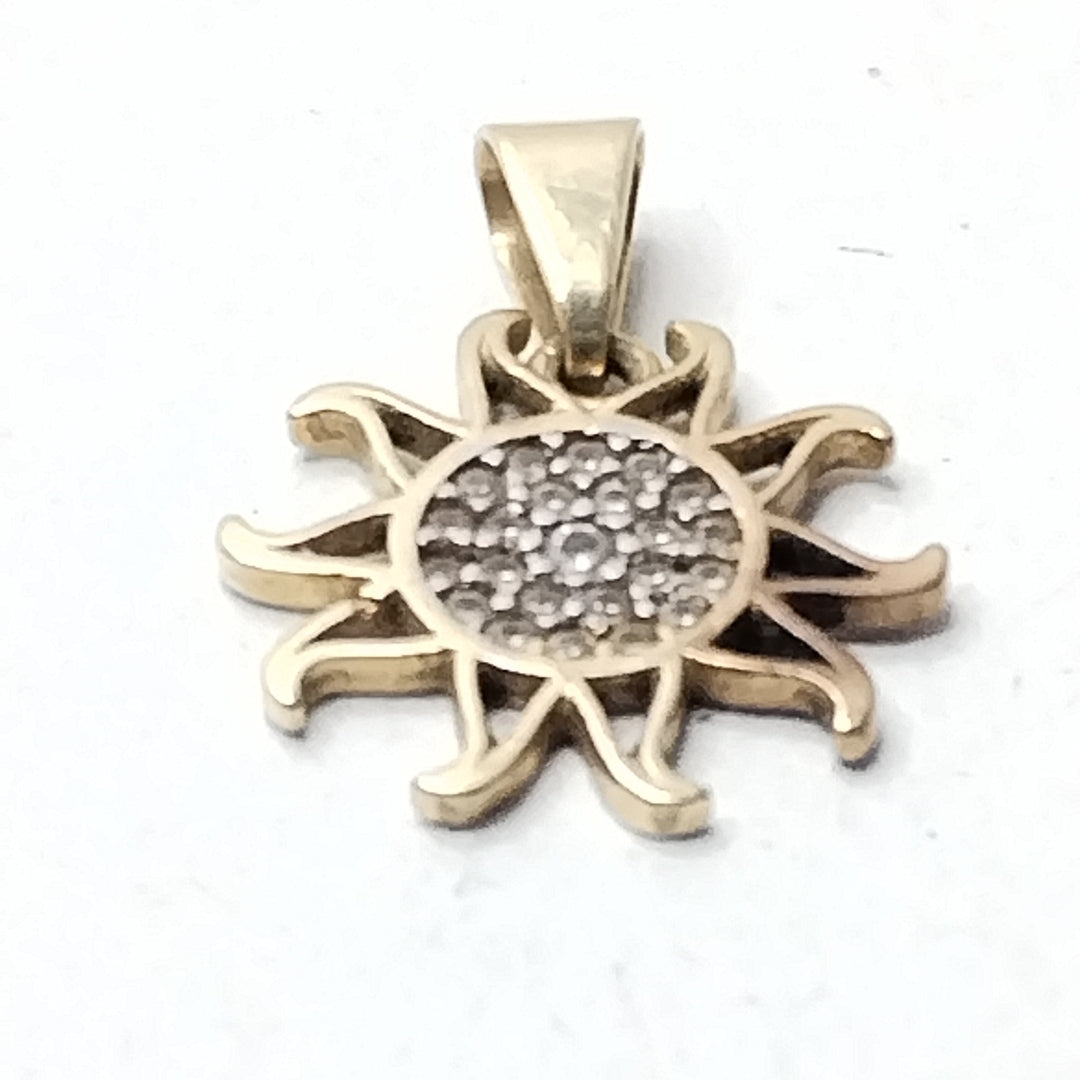 DIJE ORO,ORO COMBINADO 10 K 1,30 GRMS (SEMINUEVO)