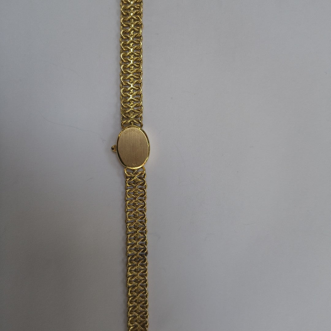 RELOJ CAJA Y PULSO ORO ORO 14 K 13.6 GRMS (SEMINUEVO)