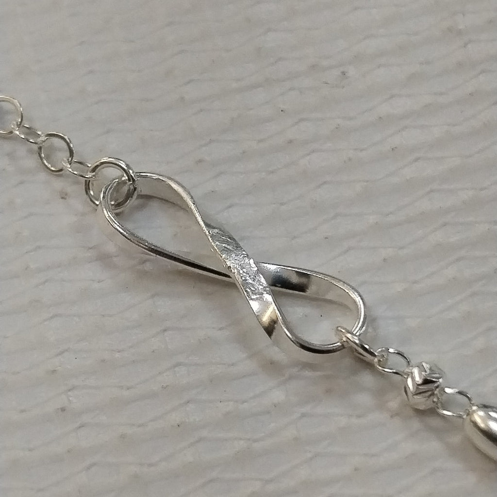 PULSERA TEJIDO INFINITO PLATA .925 18 CM 2.4 GR (NUEVO)