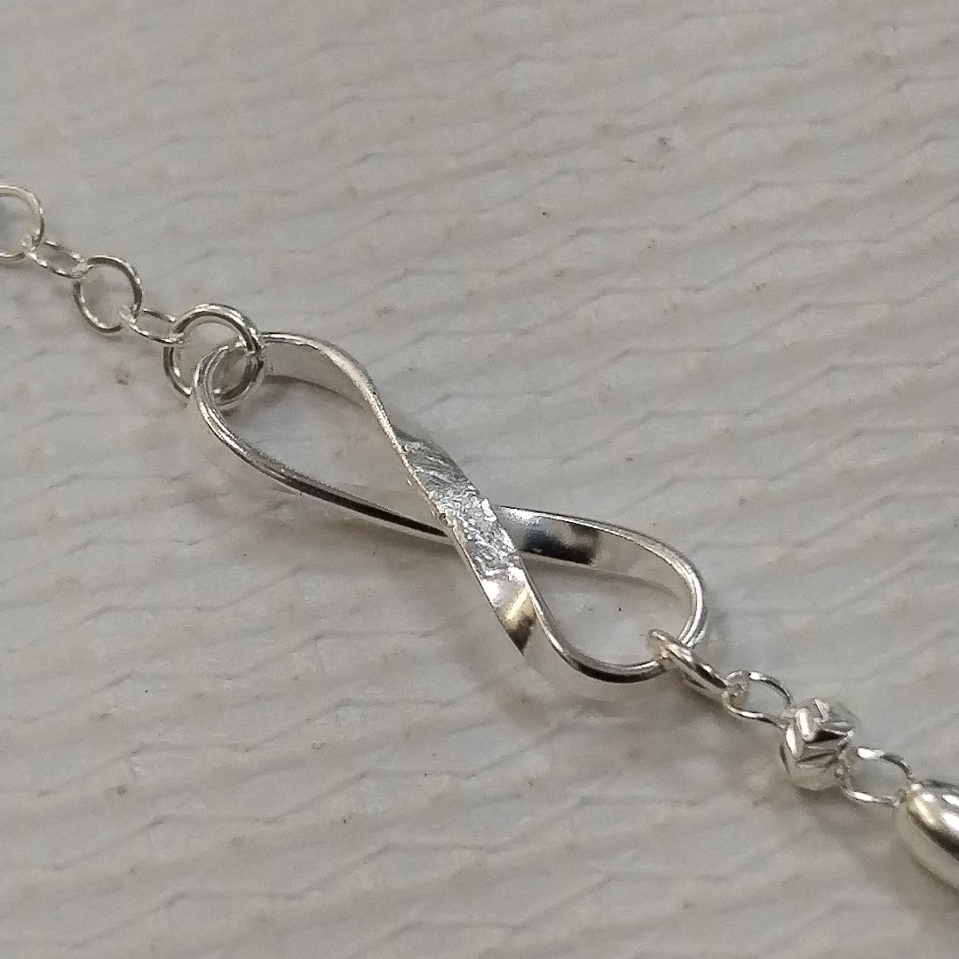 PULSERA TEJIDO INFINITO PLATA .925 18 CM 2.4 GR (NUEVO)