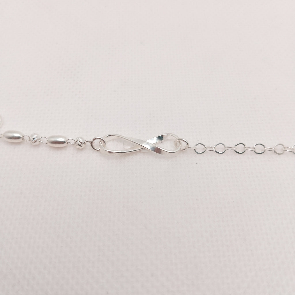 PULSERA TEJIDO INFINITO PLATA .925 18 CM 2.4 GR (NUEVO)