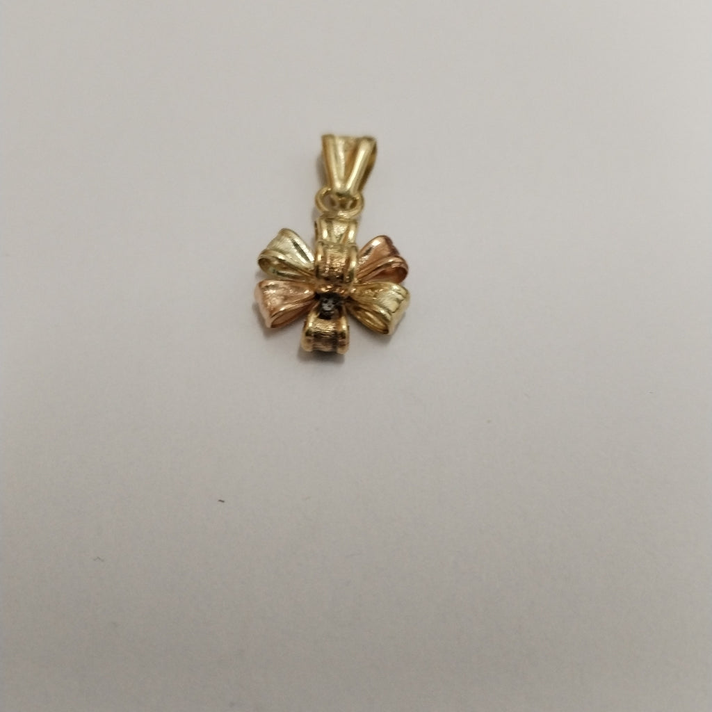DIJE ORO, ORO COMBINADO 10 K 0.9 GRMS (SEMINUEVO)