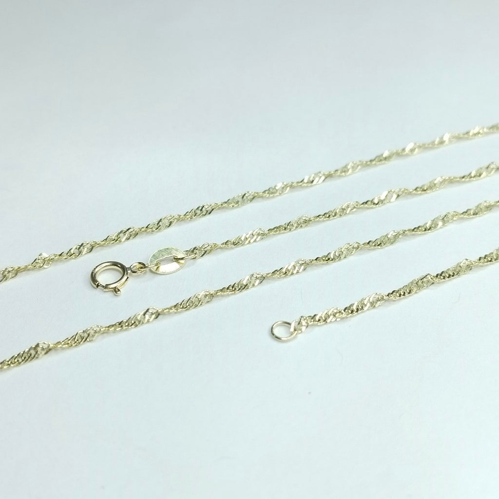 CADENAS TEJIDO MEDIO TORZAL ORO 10K 55 CM 2.5 GR (NUEVO)