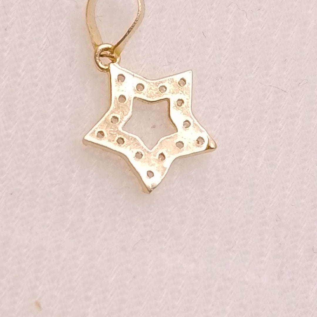 DIJES ESTRELLA C/CIRCONIAS ORO 10K 0.4 GR (NUEVO)