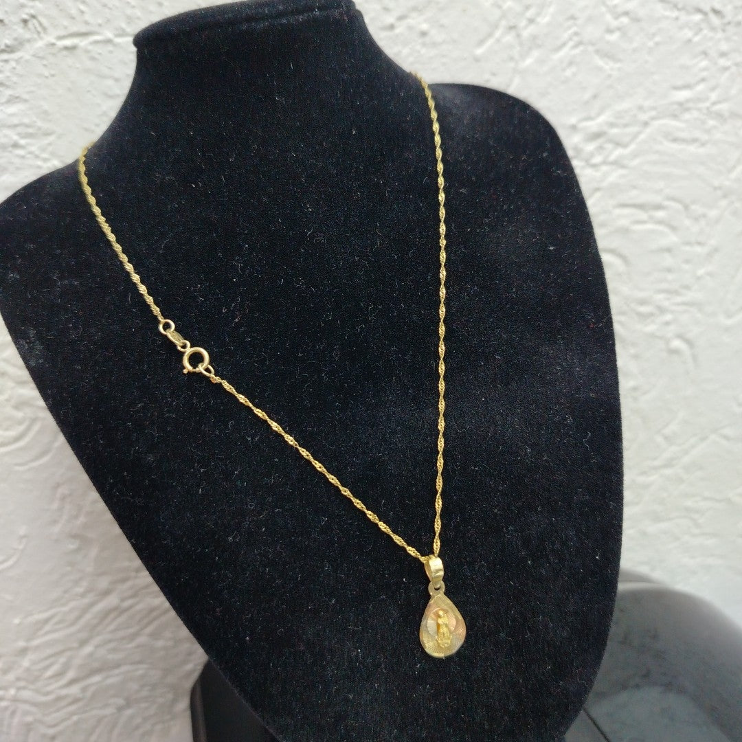 CADENA, MEDALLA RELIGIOSA ORO COMBINADO 10 K 1.6 GRMS (SEMINUEVO)