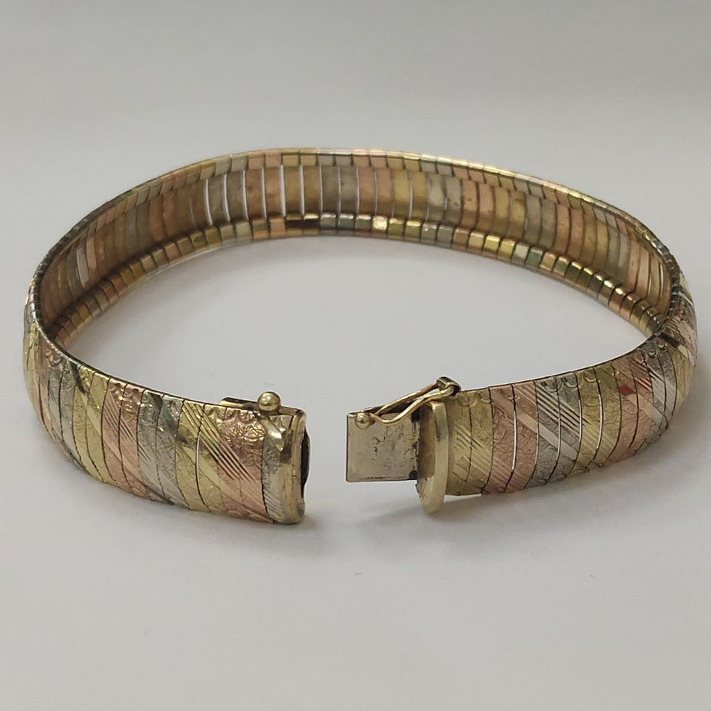 PULSERA ORO COMBINADO 14 K 21.8 GRMS (SEMINUEVO)