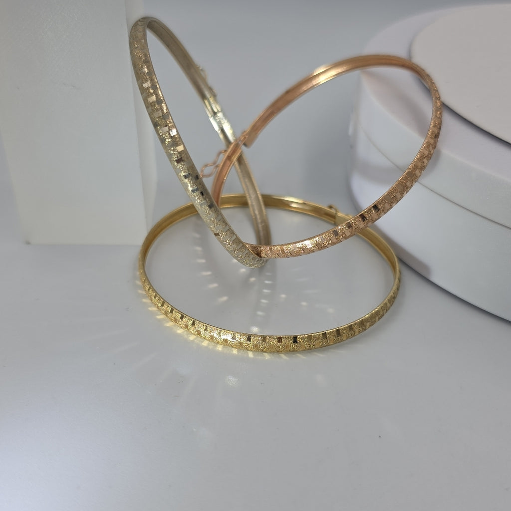 PULSERA RIGIDA ORO COMBINADO 14 K 12.8 GRMS (SEMINUEVO)