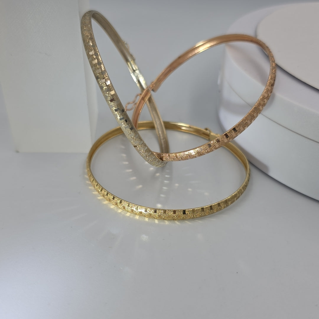 PULSERA RIGIDA ORO COMBINADO 14 K 12.8 GRMS (SEMINUEVO)