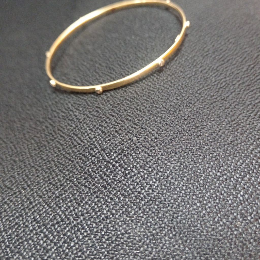 PULSERA RIGIDA ORO COMBINADO 14 K 5.4 GRMS (SEMINUEVO)