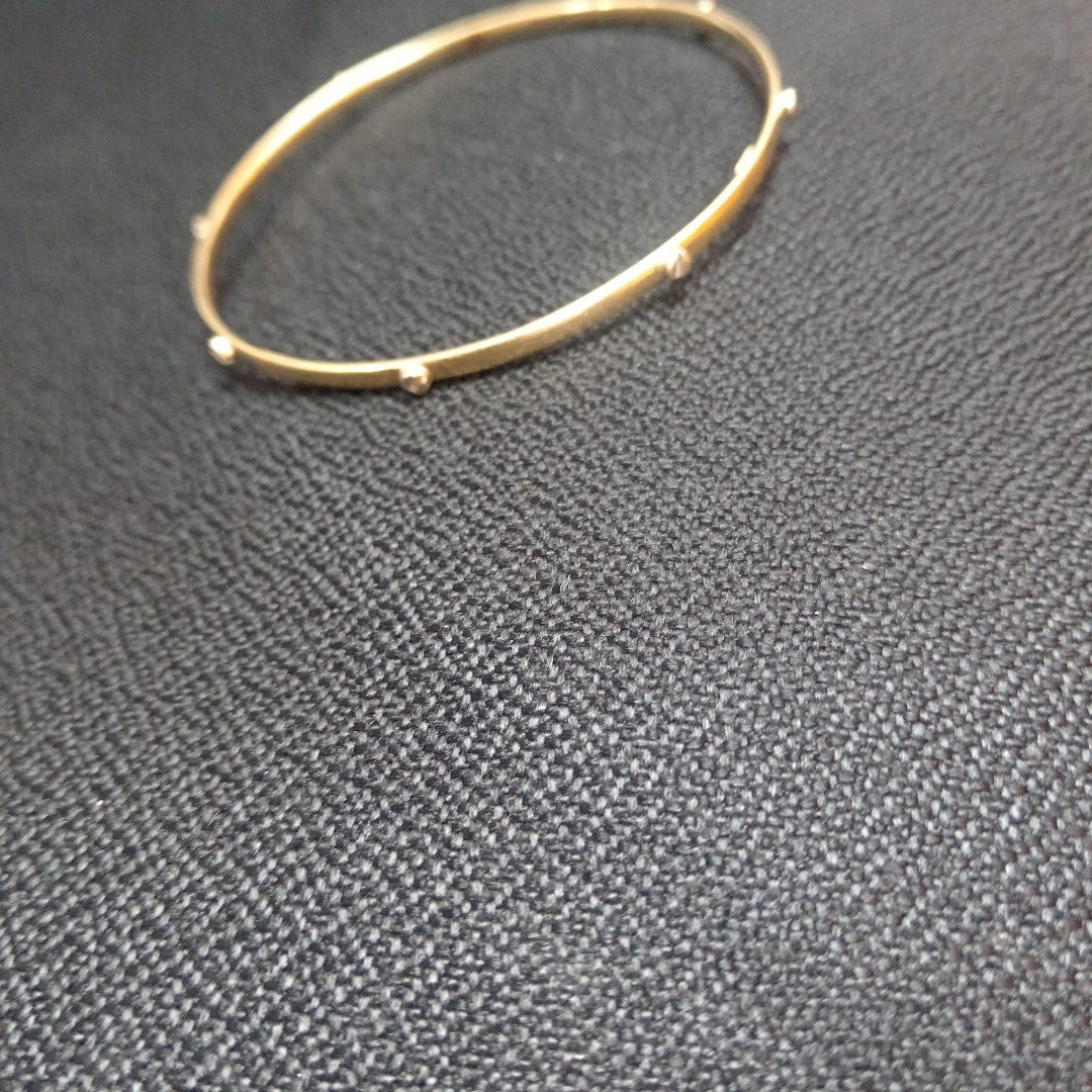 PULSERA RIGIDA ORO COMBINADO 14 K 5.4 GRMS (SEMINUEVO)