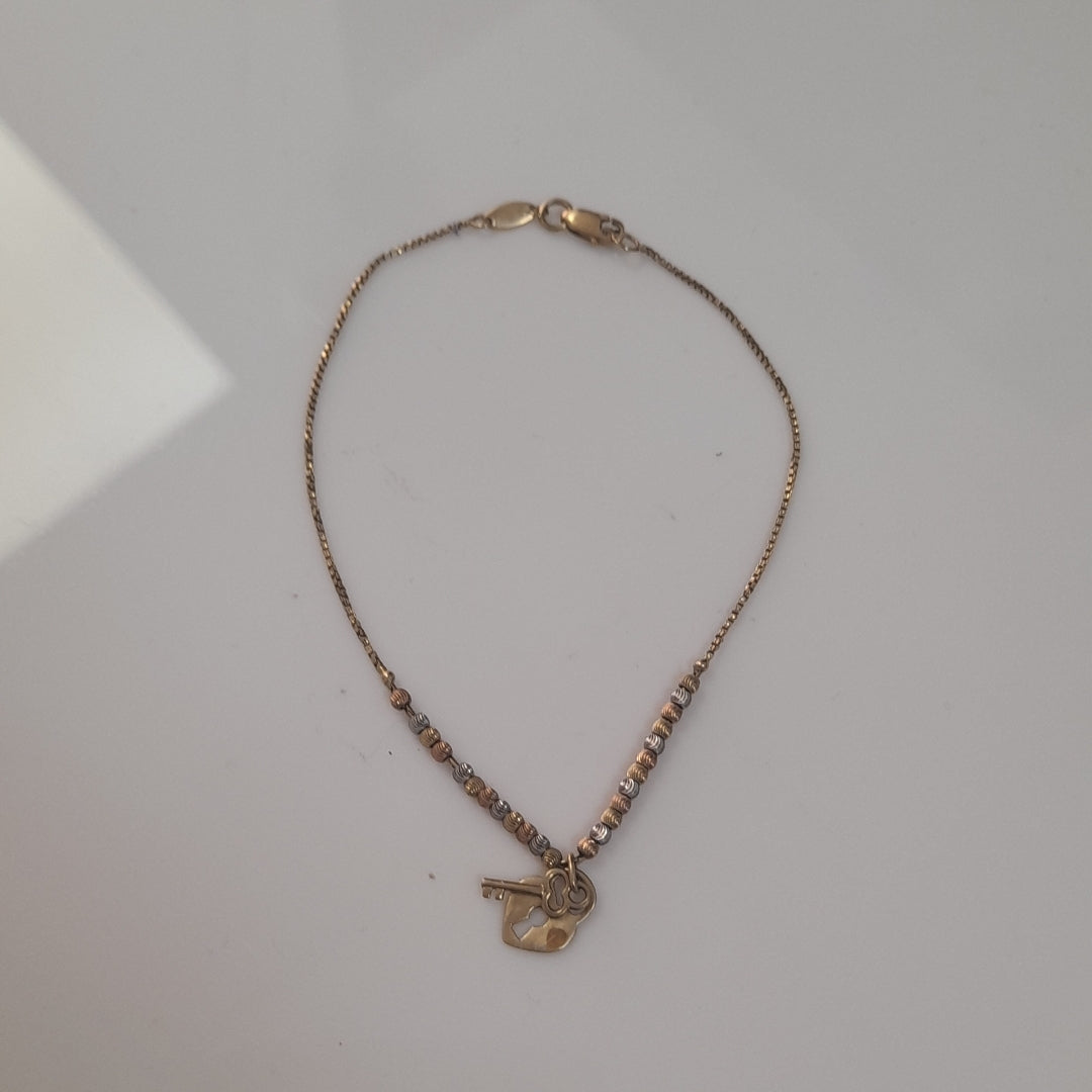 PULSERA ORO COMBINADO 14 K 2.1 GRMS (SEMINUEVO)