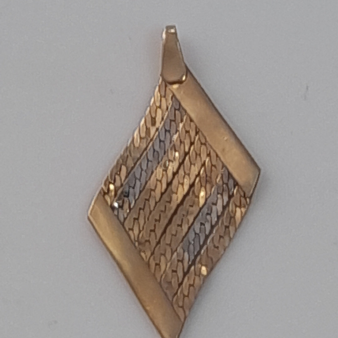 DIJE ORO COMBINADO 14 K 0.9 GRMS (SEMINUEVO)