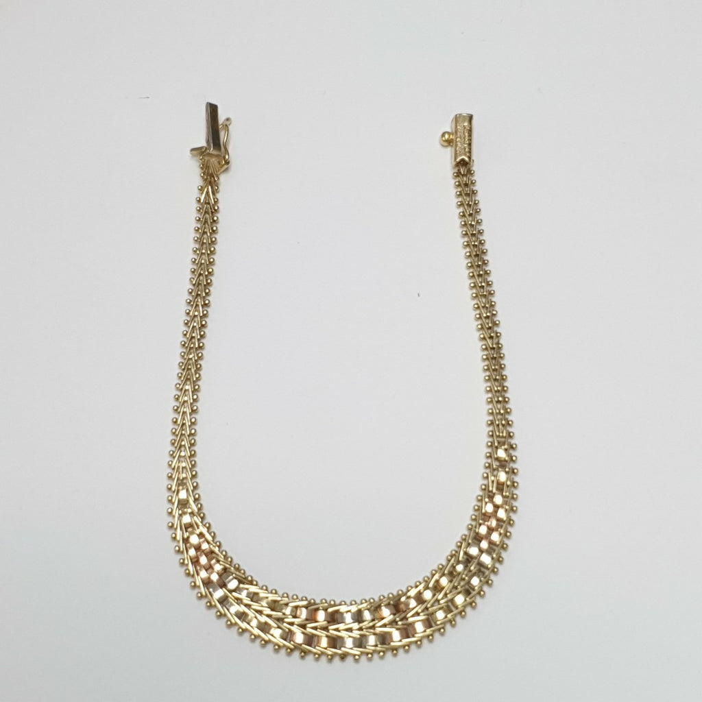 PULSERA ORO COMBINADO 14 K 7.8 GRMS (SEMINUEVO)
