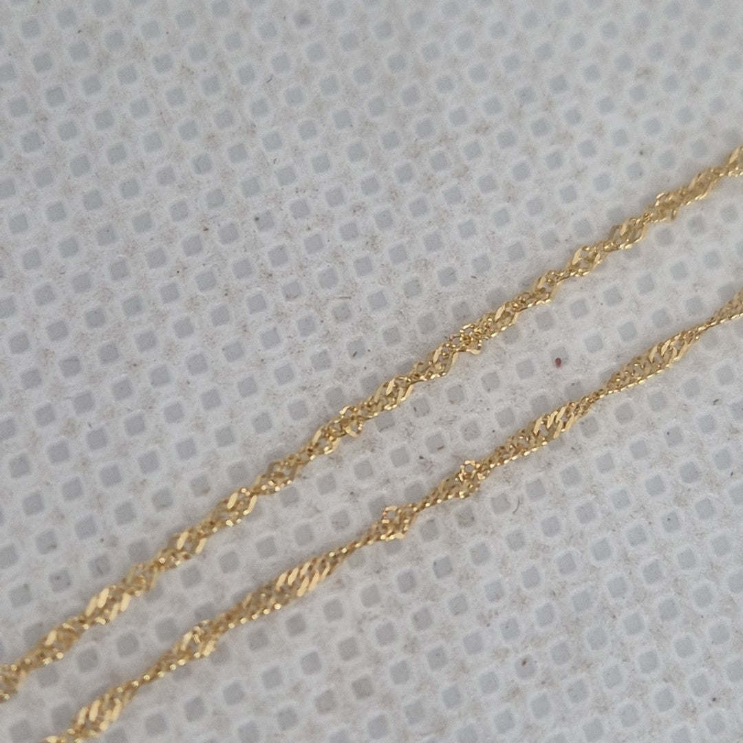 CADENA, MEDALLA RELIGIOSA ORO 10 K 1.2 GRMS (SEMINUEVO)