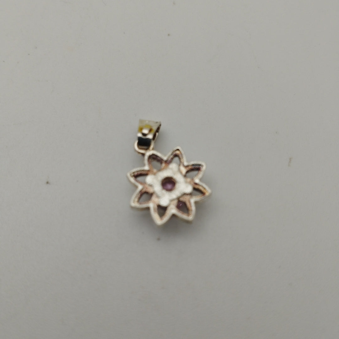 DIJE FLOR CON PIEDRA ROSA PLATA .925 2.1 GR (NUEVO)