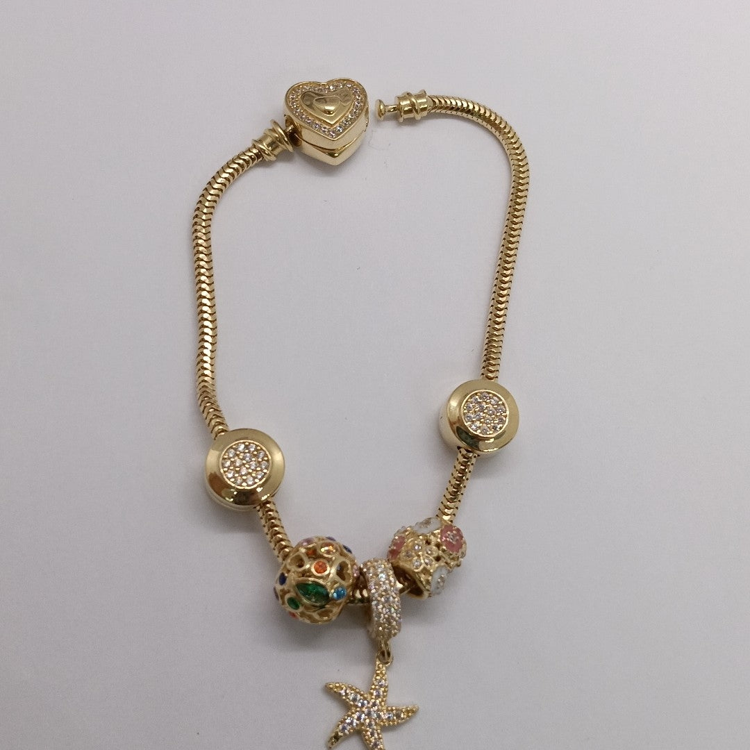 PULSERA CHARM ORO 14K 17.2 (NUEVO)