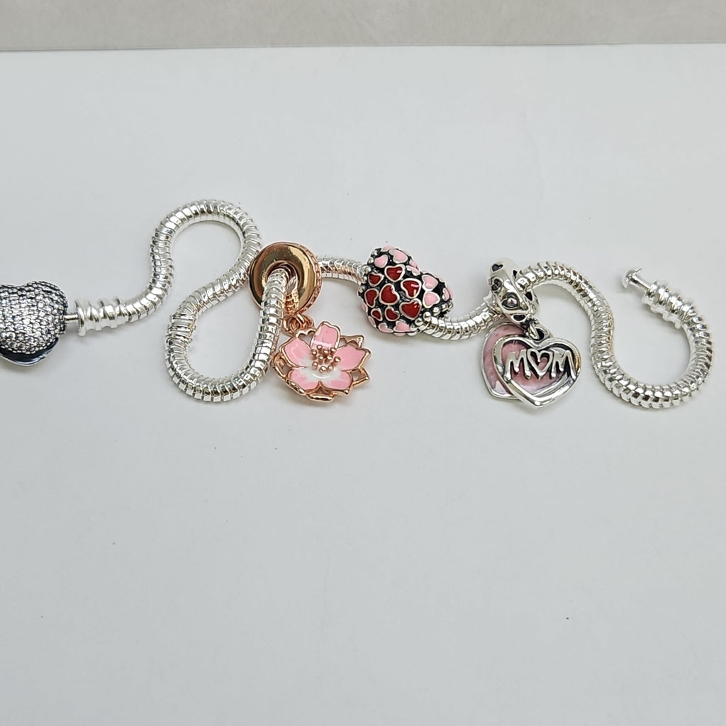 PULSERA TEJIDO ARTICULADA CON CHARMS PLATA .925 21 CM 15.2 GR (NUEVO)