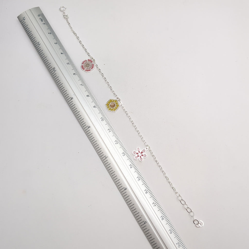 PULSERA TEJIDO ESPECIAL CON DIJE FLORES PLATA .925 21 CM 2.3 GR (NUEVO)