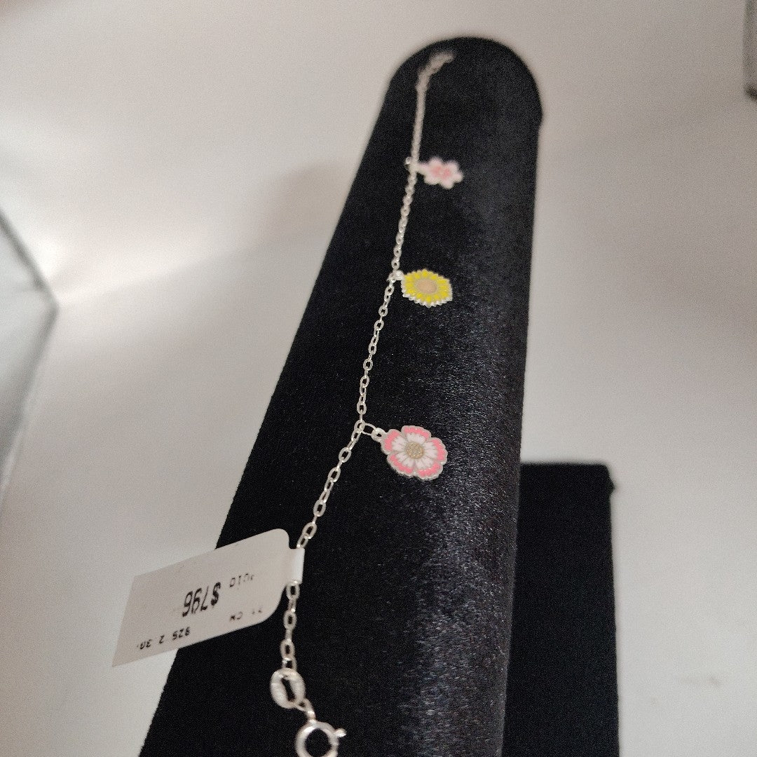 PULSERA TEJIDO ESPECIAL CON DIJE FLORES PLATA .925 21 CM 2.3 GR (NUEVO)