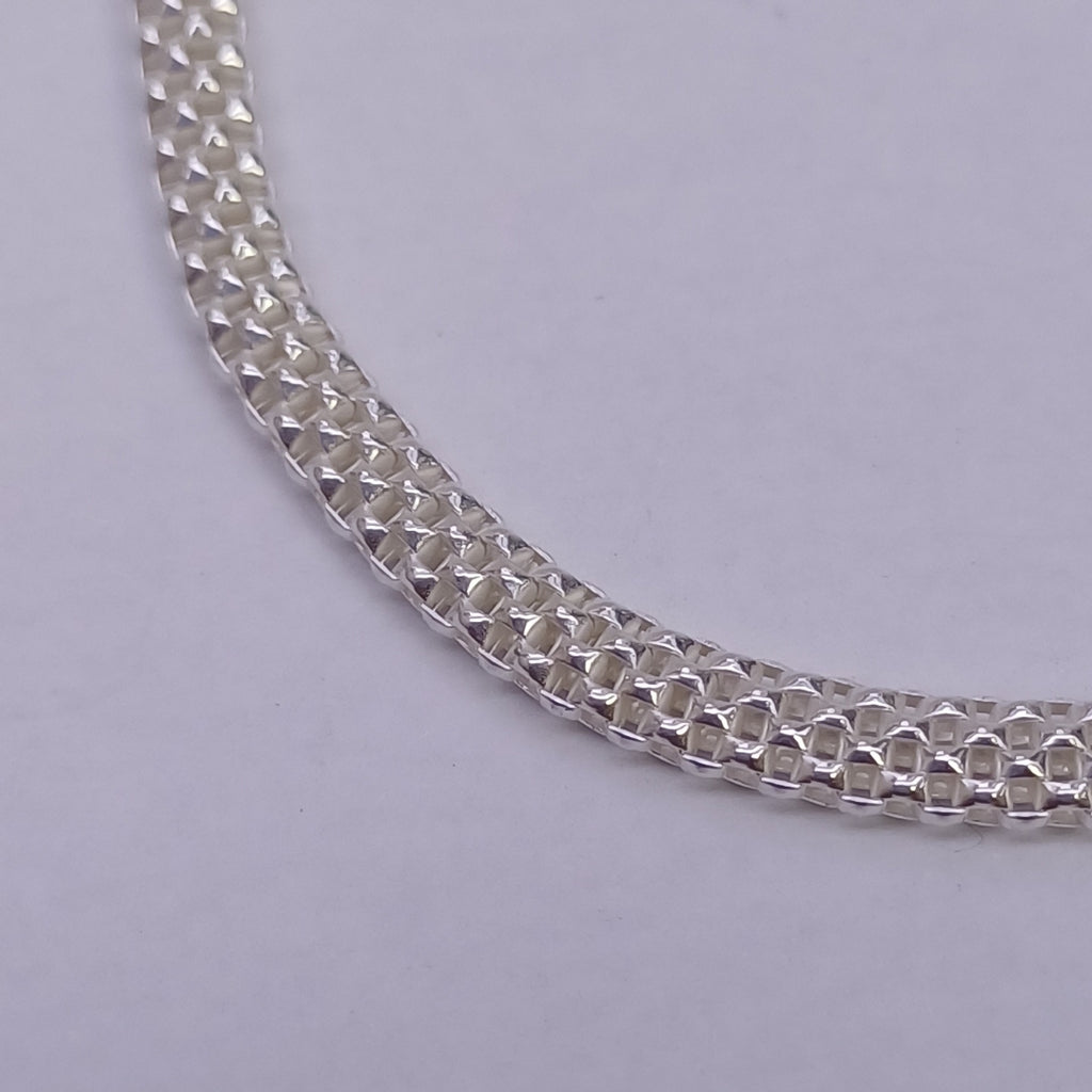 PULSERA TEJIDO ESPECIAL PLATA .925 18 CM 4.9 GR (NUEVO)