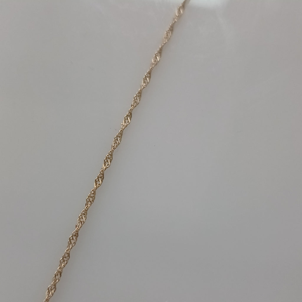 CADENA, DIJE ORO 10 K 2.5 GRMS (SEMINUEVO)