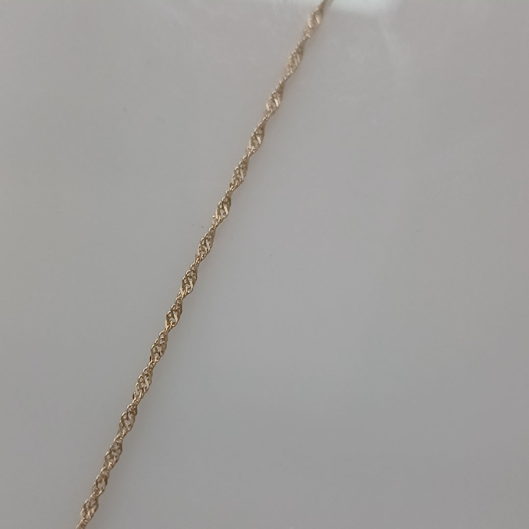 CADENA, DIJE ORO 10 K 2.5 GRMS (SEMINUEVO)