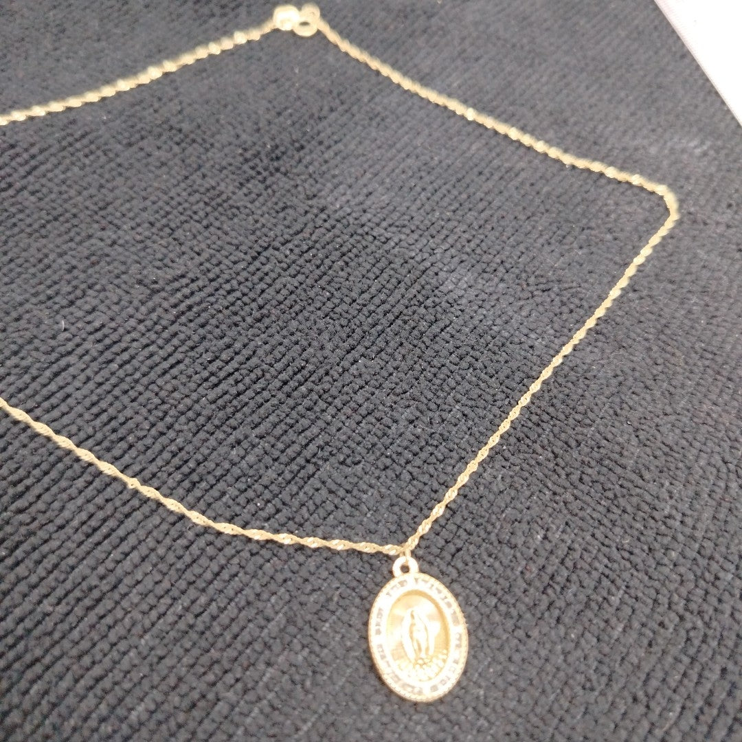 CADENA, MEDALLA RELIGIOSA ORO 10 K 2.1 GRMS (SEMINUEVO)