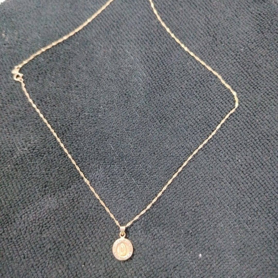 CADENA,MEDALLA RELIGIOSA ORO 10 K 1,60 GRMS (SEMINUEVO)