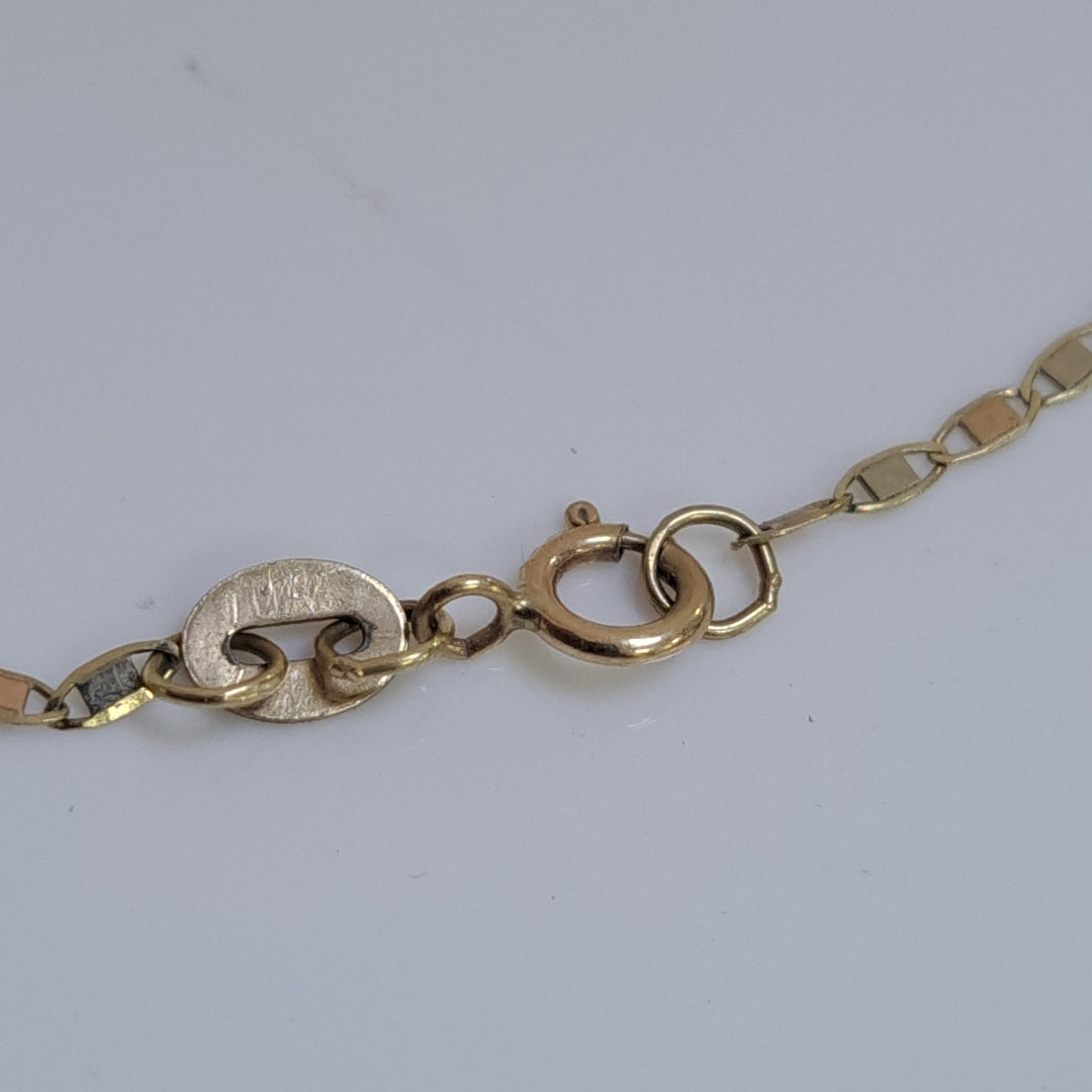 CADENA,MEDALLA RELIGIOSA ORO 10 K 2,20 GRMS (SEMINUEVO)