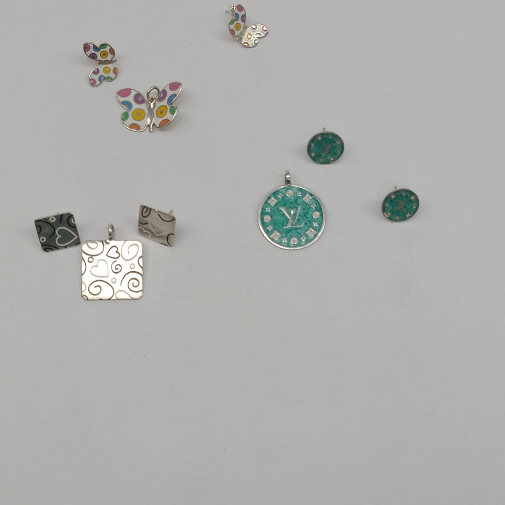 ARETES PAR, DIJE PLATA 49.6 GRMS (SEMINUEVO)