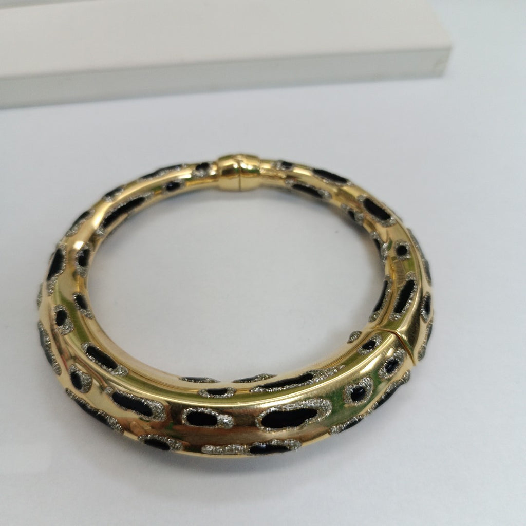 PULSERA RIGIDA ORO 14 K 21.9 GRMS (SEMINUEVO)