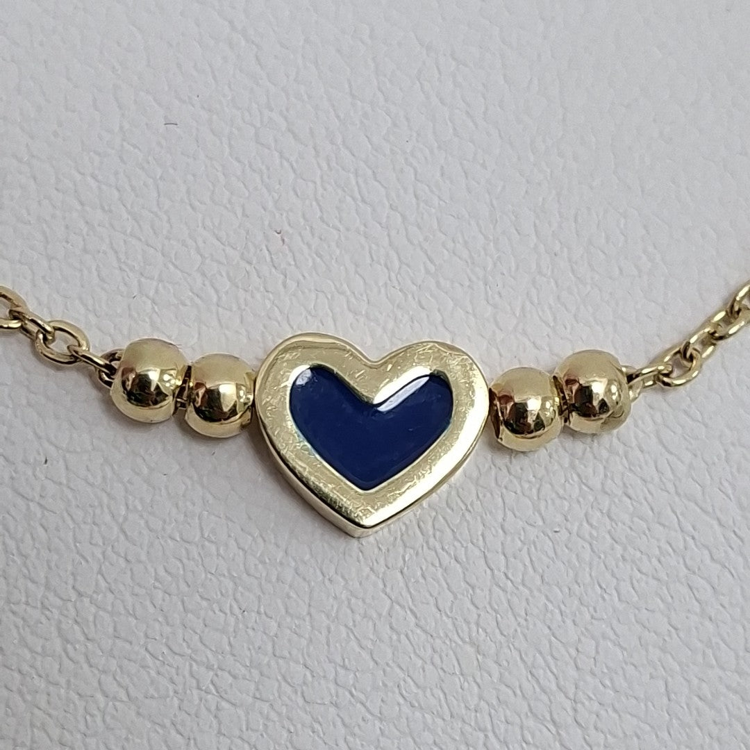 PULSERA TEJIDO ESPECIAL CON FIGURA CORAZON CON ESMALTE AZUL 14K 18 CM 2.2 GR (NUEVO)
