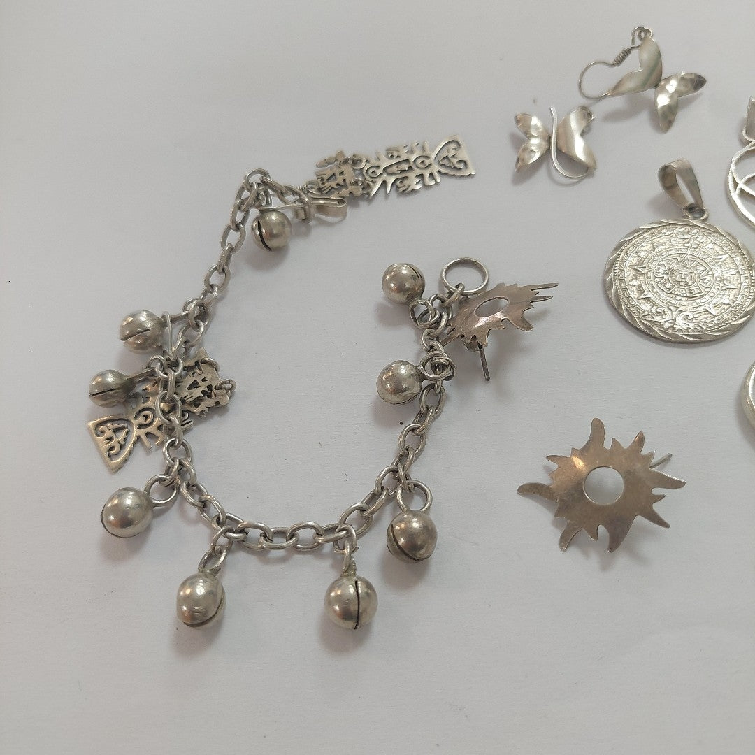 ARETES PAR,DIJE,PULSERA PLATA 65,80 GRMS (SEMINUEVO)