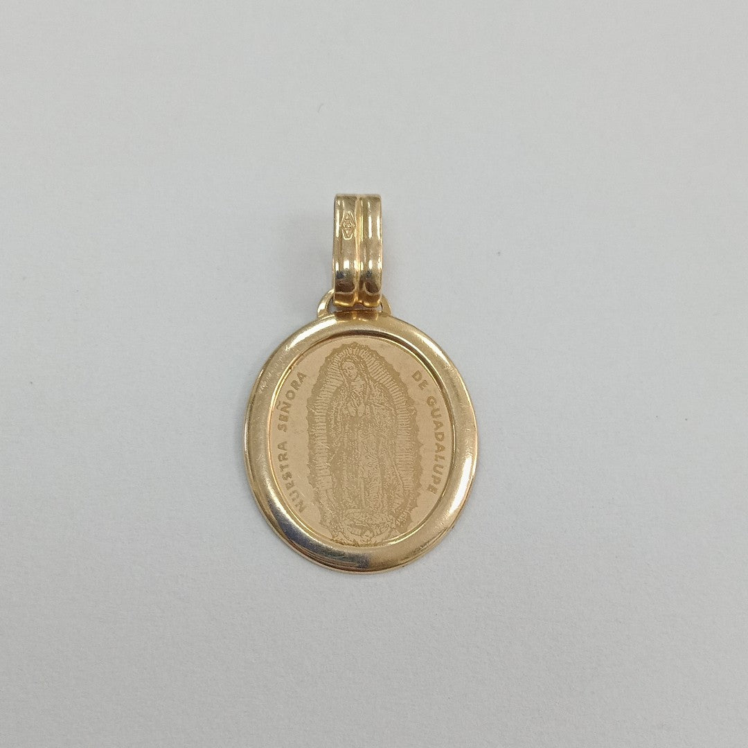 DIJE,MEDALLA RELIGIOSA ORO 14 K 1,60 GRMS (SEMINUEVO)