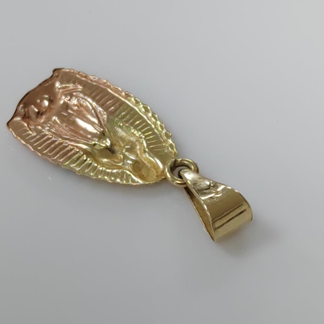 DIJE ORO COMBINADO 14 K 0.6 GRMS (SEMINUEVO)
