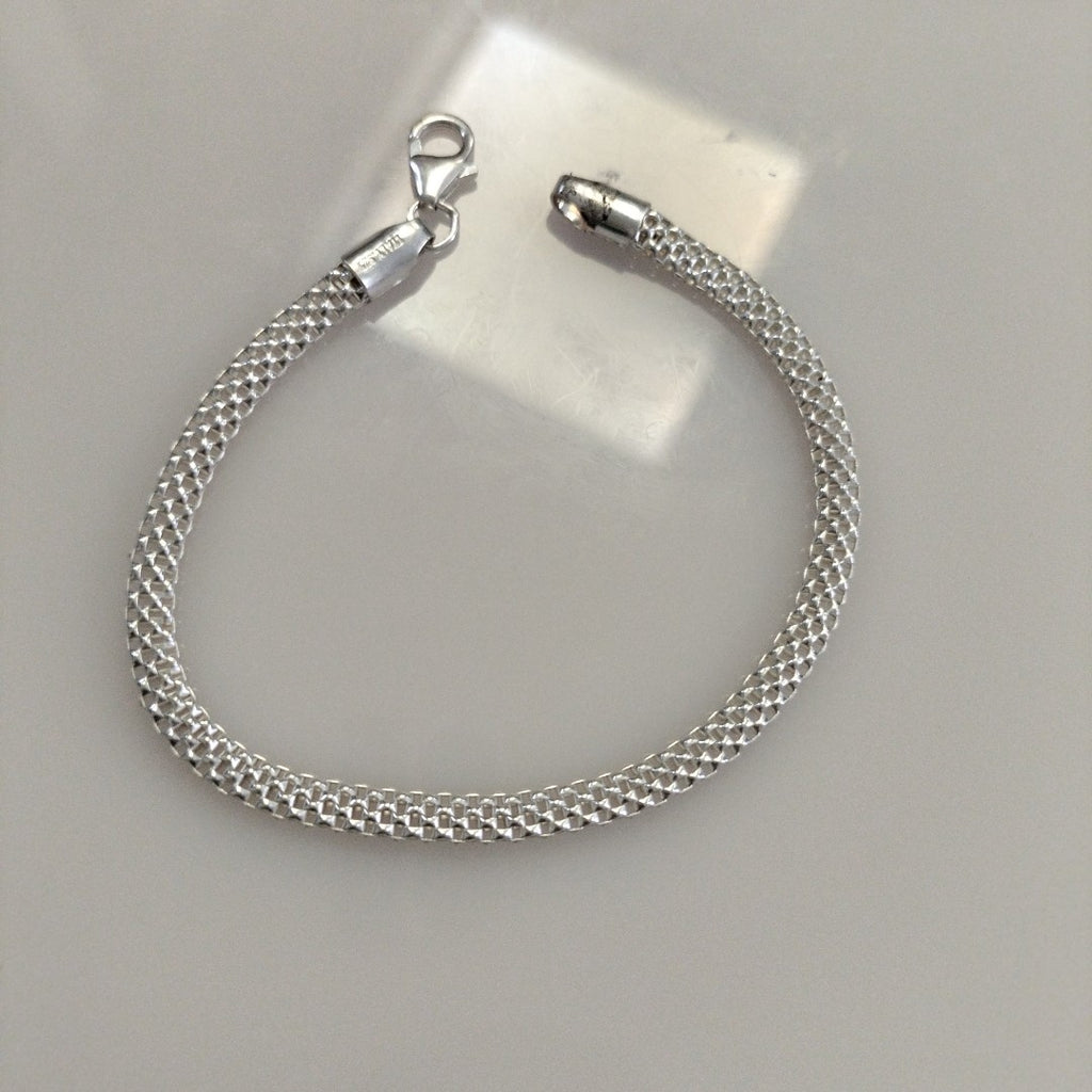 PULSERA TEJIDO ESPECIAL PLATA .925 18 CM 4.9 GR (NUEVO)