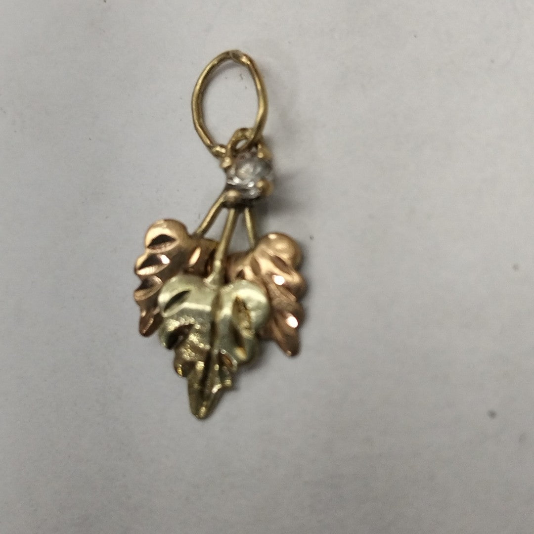 DIJE ORO, ORO COMBINADO 8 K 0.6 GRMS (SEMINUEVO)