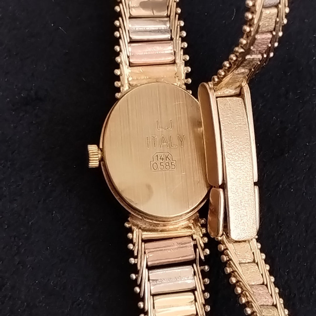 RELOJ CAJA Y PULSO ORO ORO, ORO COMBINADO 14 K 18.7 GRMS (SEMINUEVO)