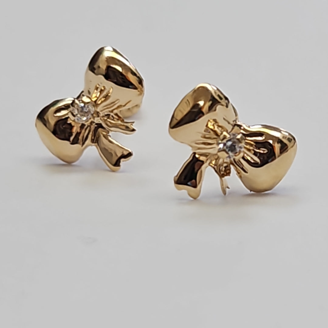 BROQUELES BROQUEL FIG MOÑO C CIRCONIA 14K 0.2441 GR (NUEVO)