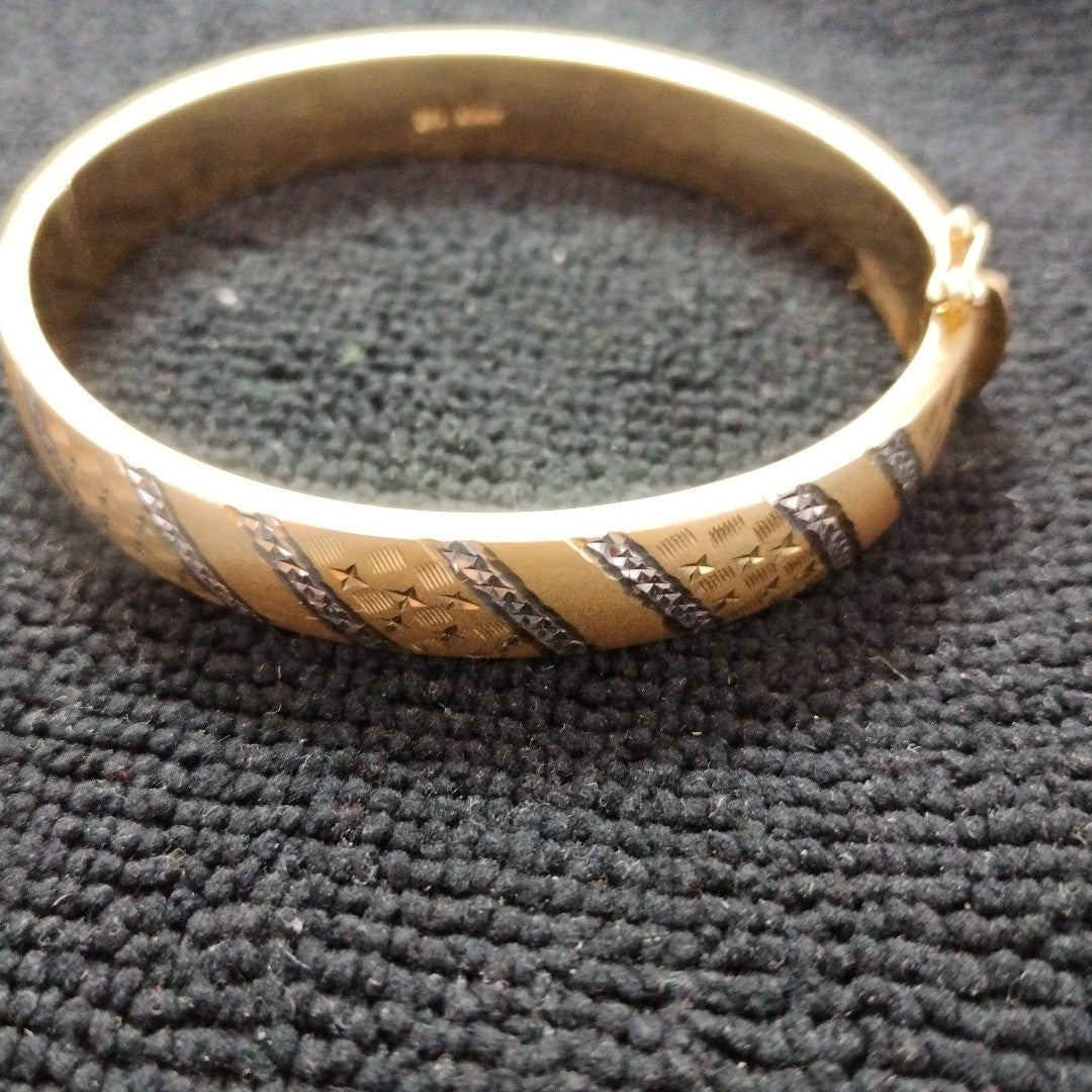PULSERA RIGIDA ORO COMBINADO 14 K 16,50 GRMS (SEMINUEVO)