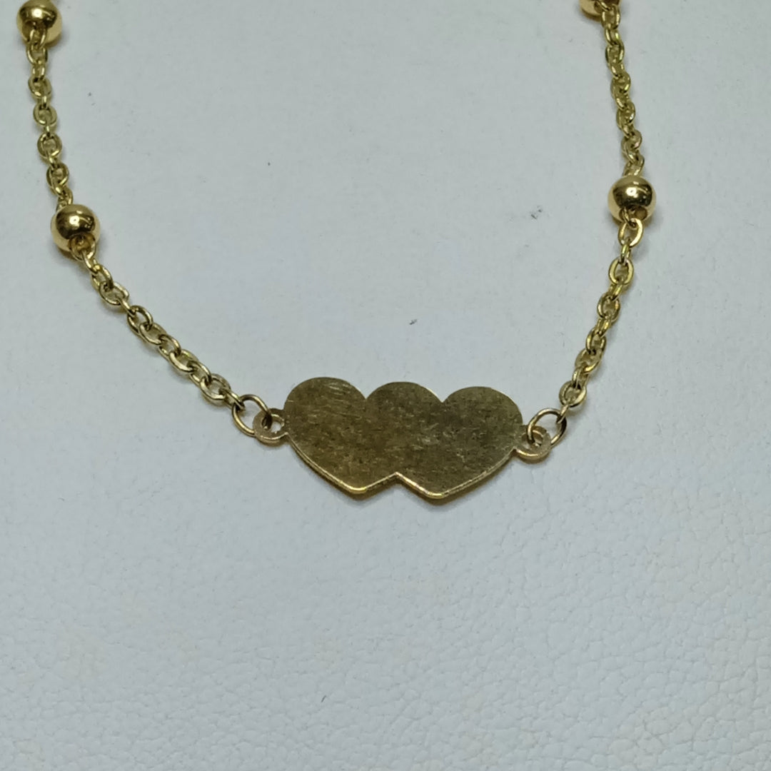PULSERA TEJIDO ESPECIAL CON DOS CORAZONES 14K 18 CM 1.7 GR (NUEVO)