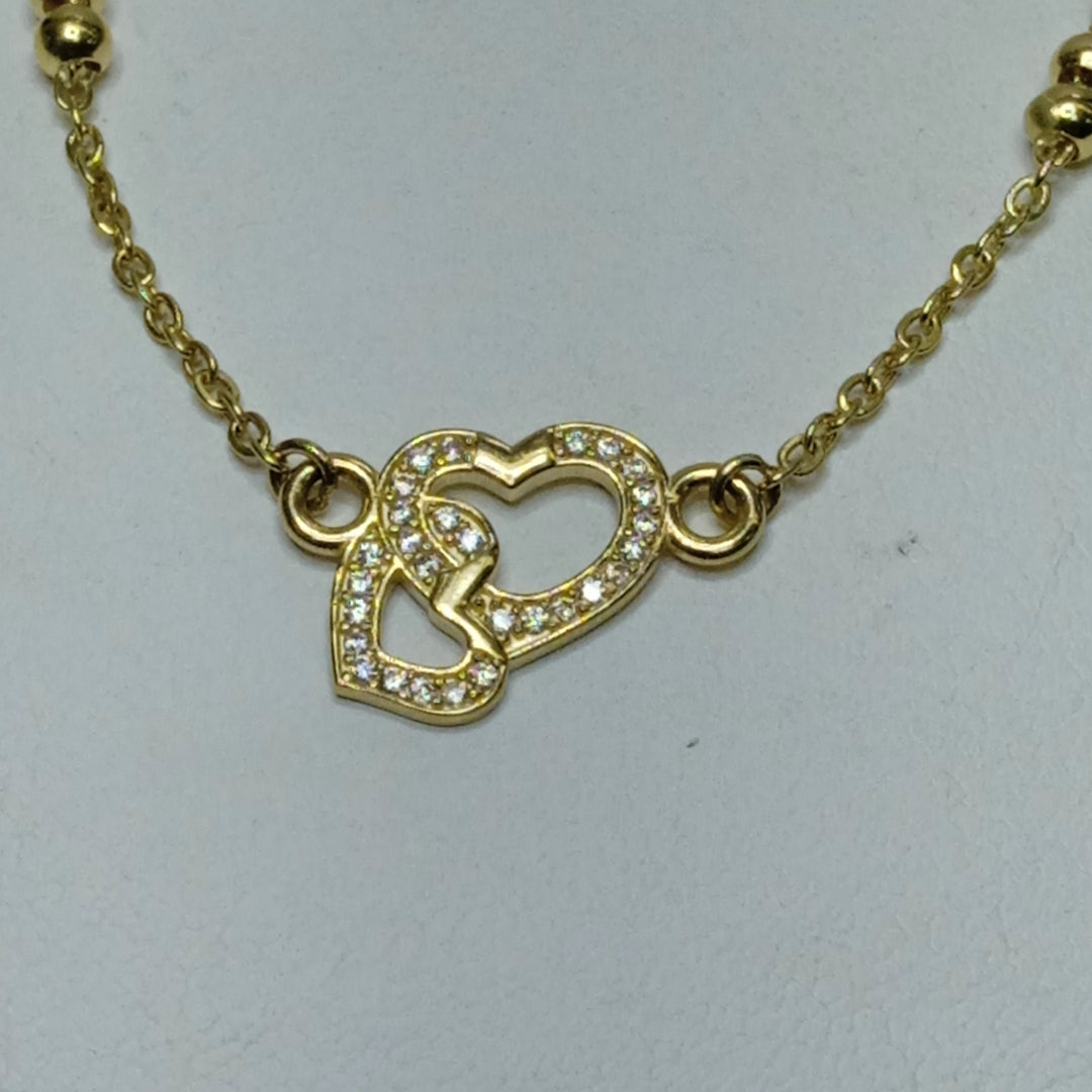 PULSERA TEJIDO ESPECIAL CORAZONES CON CIRCONIAS 14K 18 CM 2.4 GR (NUEVO)