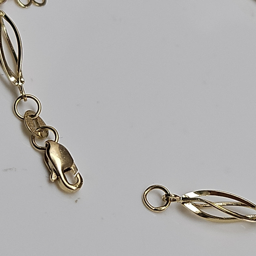 PULSERA ESPECIAL CON FLORES 14K 18 CM 2.6 GR (NUEVO)