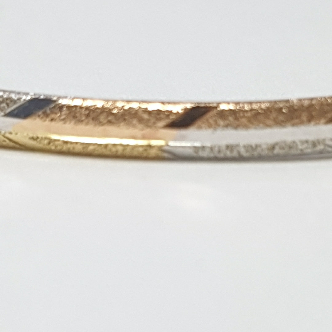 PULSERA RIGIDA ORO COMBINADO 10 K 3,20 GRMS (SEMINUEVO)