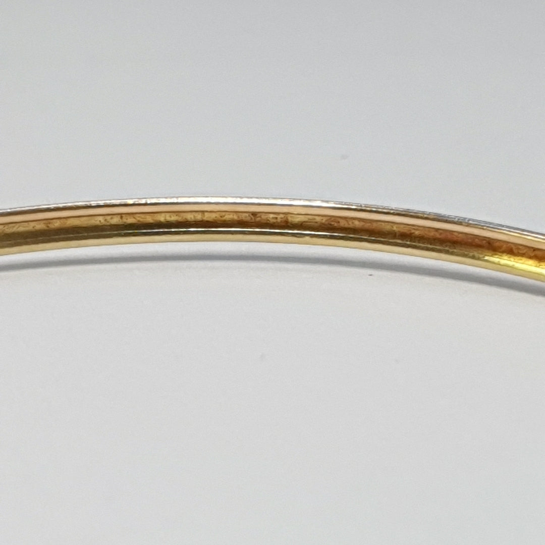 PULSERA RIGIDA ORO COMBINADO 10 K 3,10 GRMS (SEMINUEVO)
